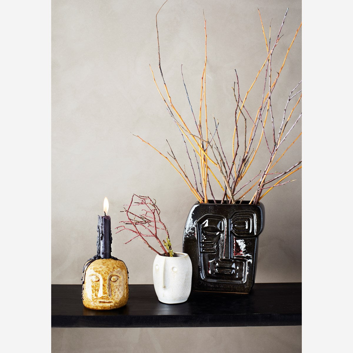 Stoneware flowerpot with a face