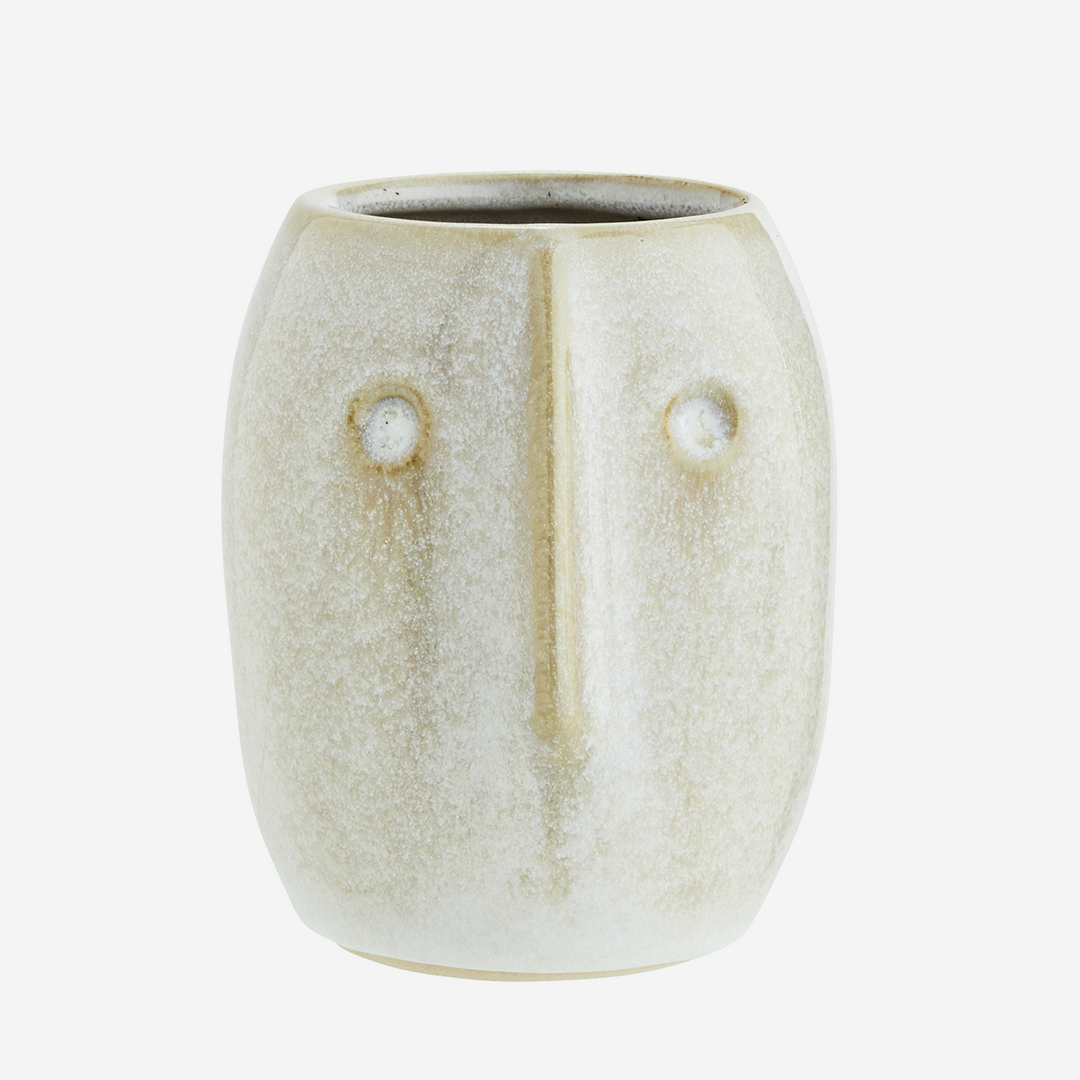 Stoneware flowerpot with a face